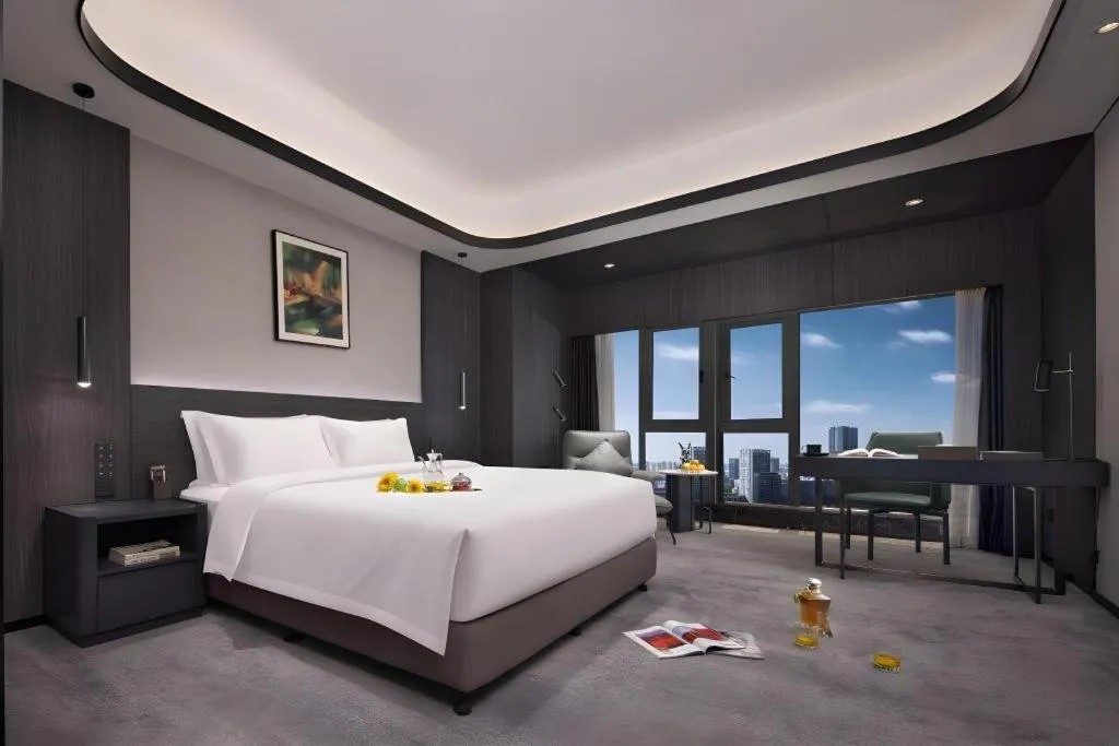 Bed in Changsha Jasmine International Hotel