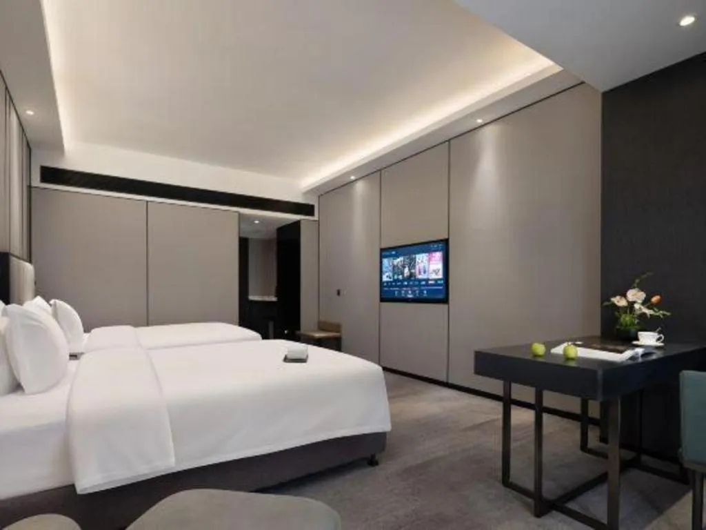 Bed in Changsha Jasmine International Hotel