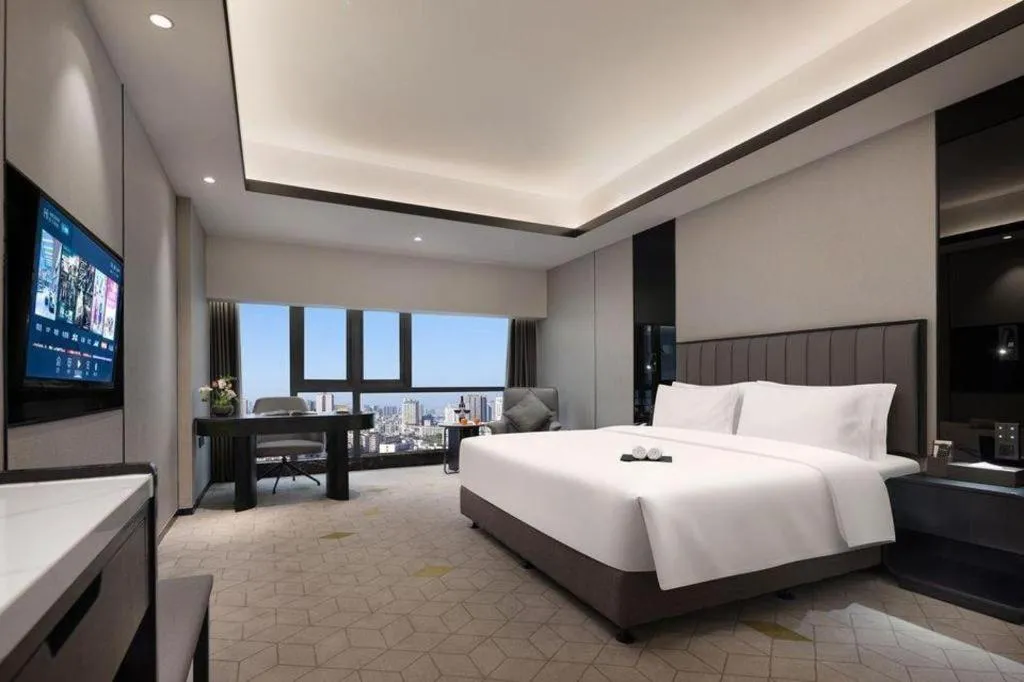 Bed in Changsha Jasmine International Hotel