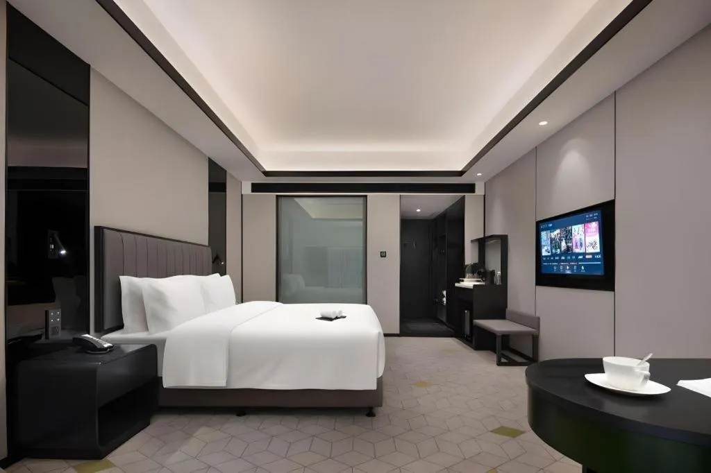 Bed in Changsha Jasmine International Hotel