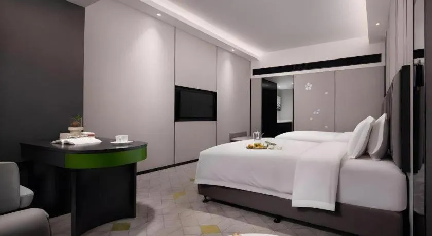 Bed in Changsha Jasmine International Hotel