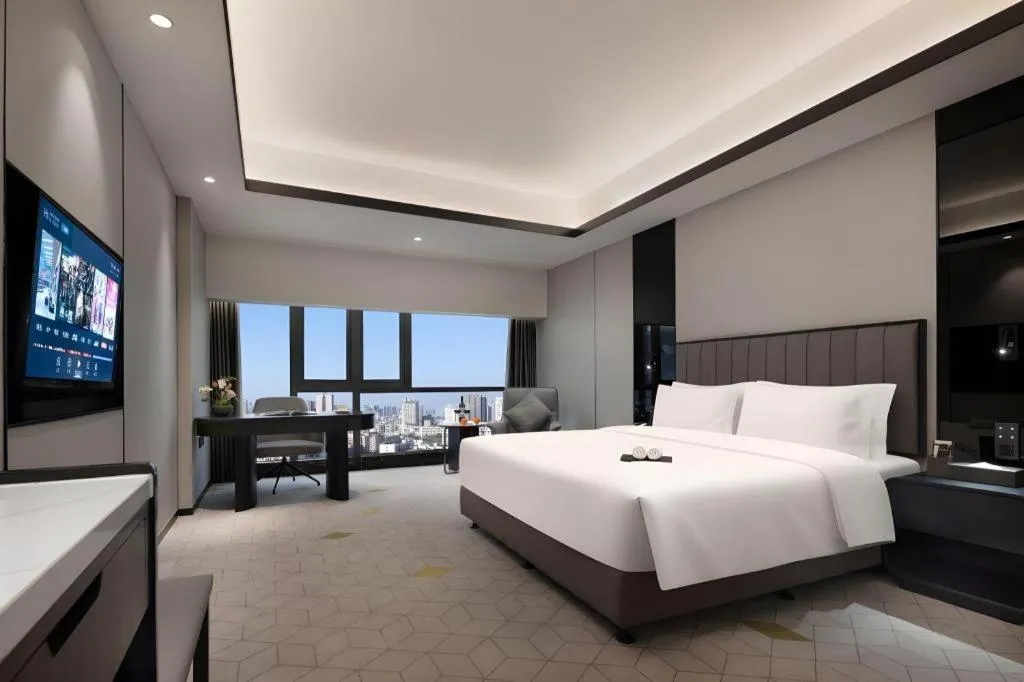 Bed in Changsha Jasmine International Hotel