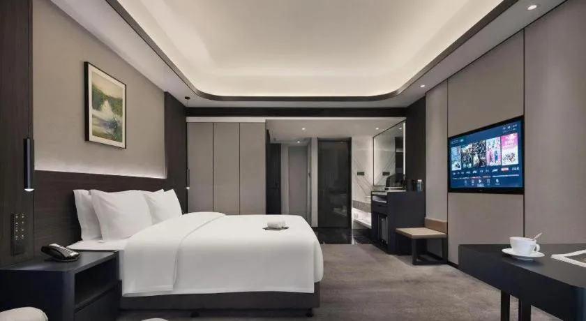 Bed in Changsha Jasmine International Hotel