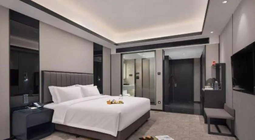 Bed in Changsha Jasmine International Hotel