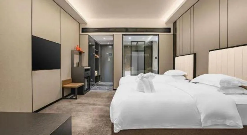 Bed in Changsha Jasmine International Hotel