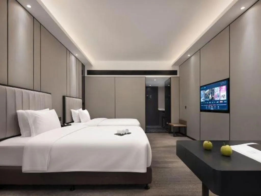 Bed in Changsha Jasmine International Hotel