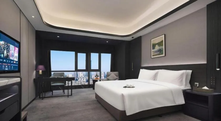 Bed in Changsha Jasmine International Hotel