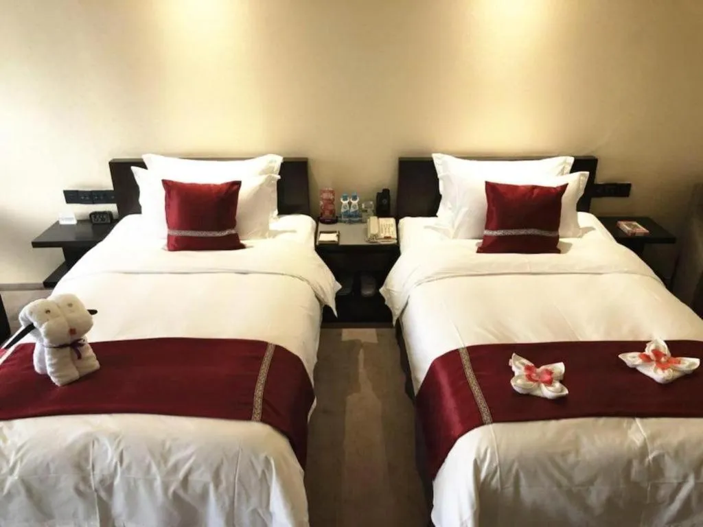 Bed in Changsha Jasmine International Hotel