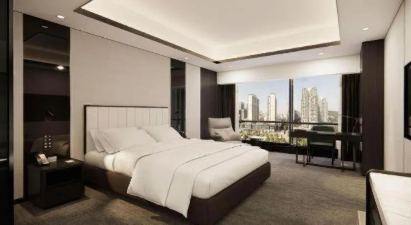 Bed in Changsha Jasmine International Hotel