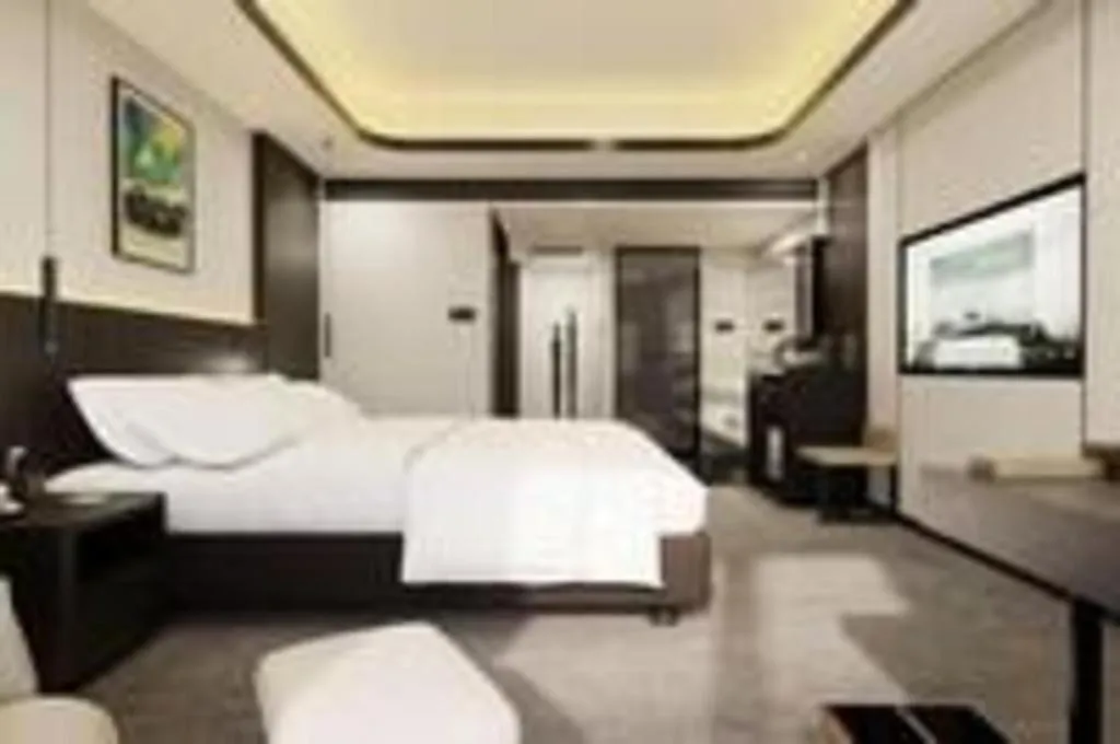 Bed in Changsha Jasmine International Hotel