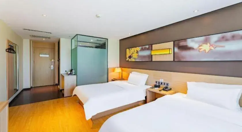 Bed in IU Hotel Tianjin Tianta Scenic Spot Wujiayao Metro Station Bed in IU Hotel Tianjin Tianta Scenic Spot Wujiayao Metro Station