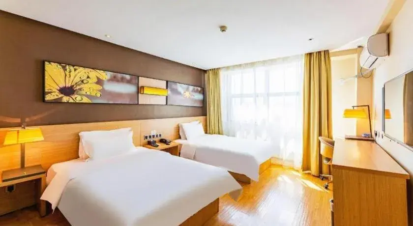 Bed in IU Hotel Tianjin Tianta Scenic Spot Wujiayao Metro Station Bed in IU Hotel Tianjin Tianta Scenic Spot Wujiayao Metro Station