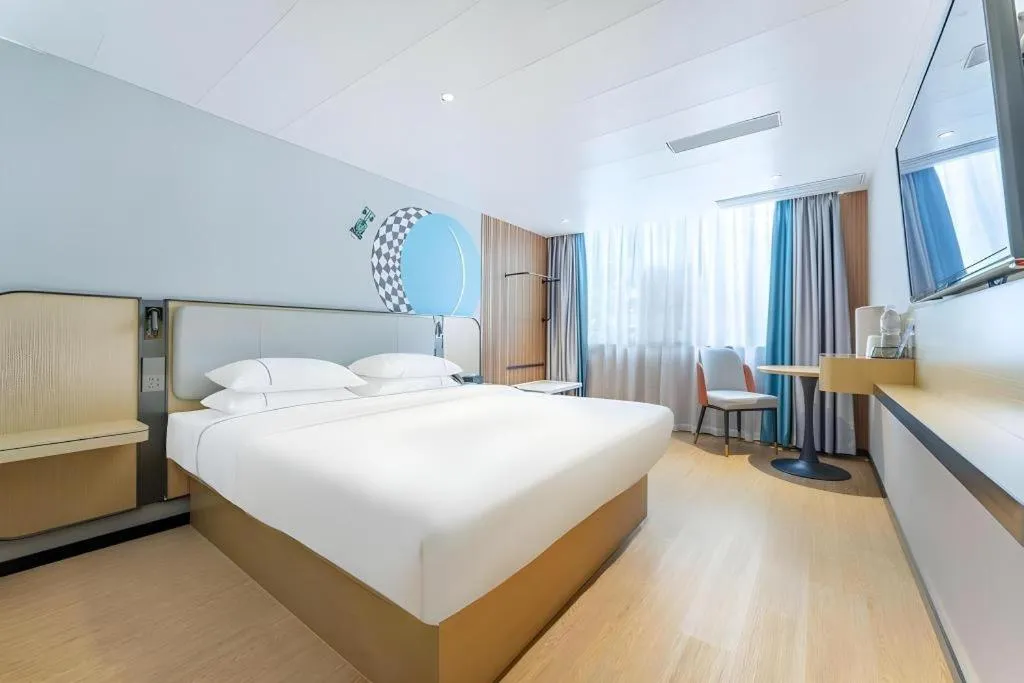 Bed in City Comfort Inn Guangzhou Jiaokou Metro Station