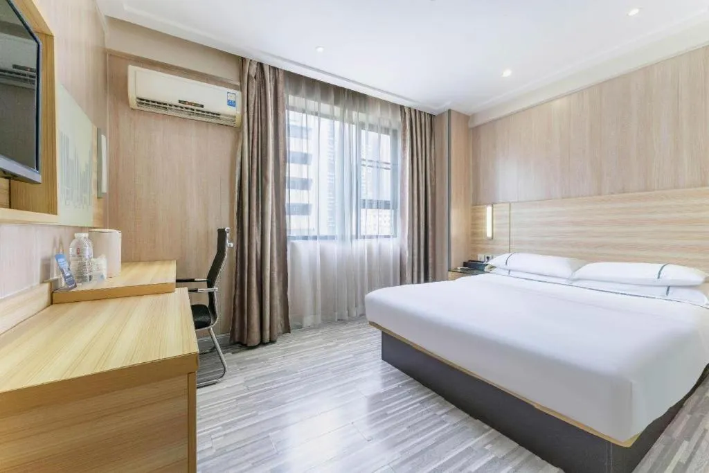 Bed in City Comfort Inn Guangzhou Jiaokou Metro Station