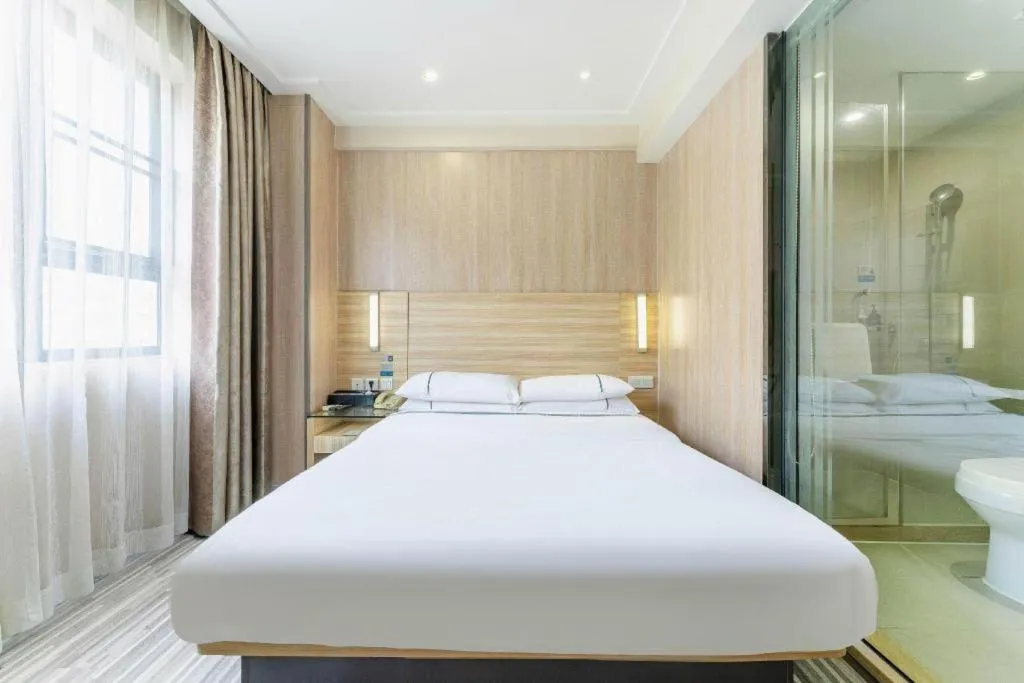Bed in City Comfort Inn Guangzhou Jiaokou Metro Station
