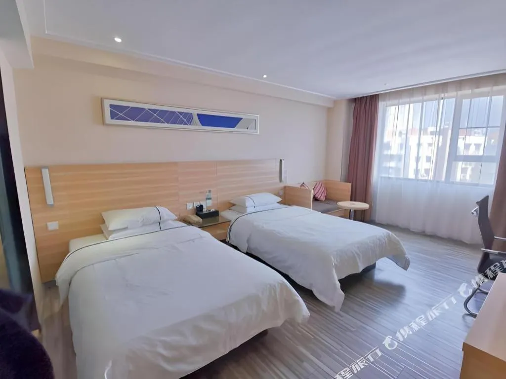 Bed in City Comfort Inn Guangzhou Jiaokou Metro Station