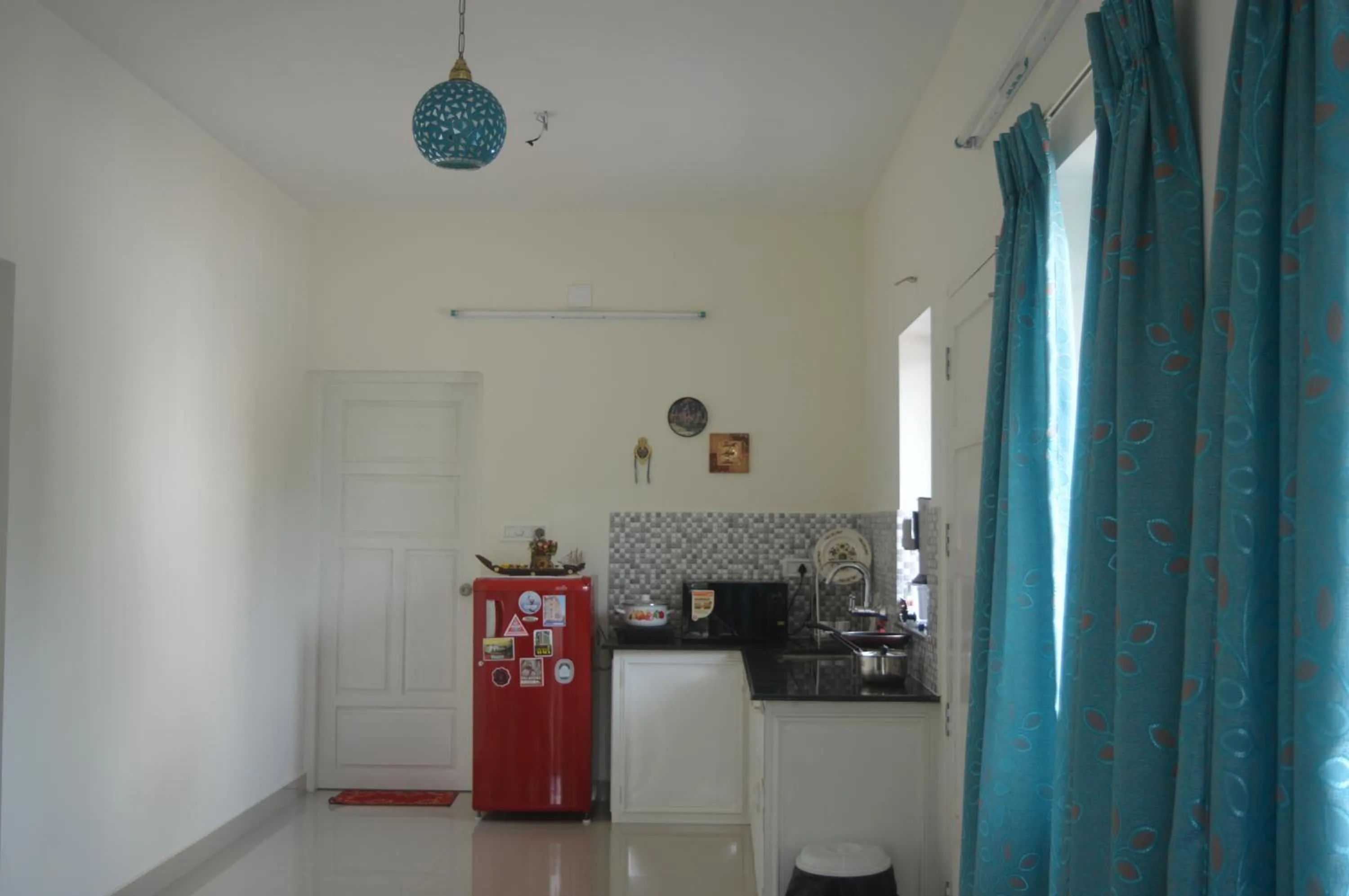 Communal kitchen in The Pod Cochin Homestay