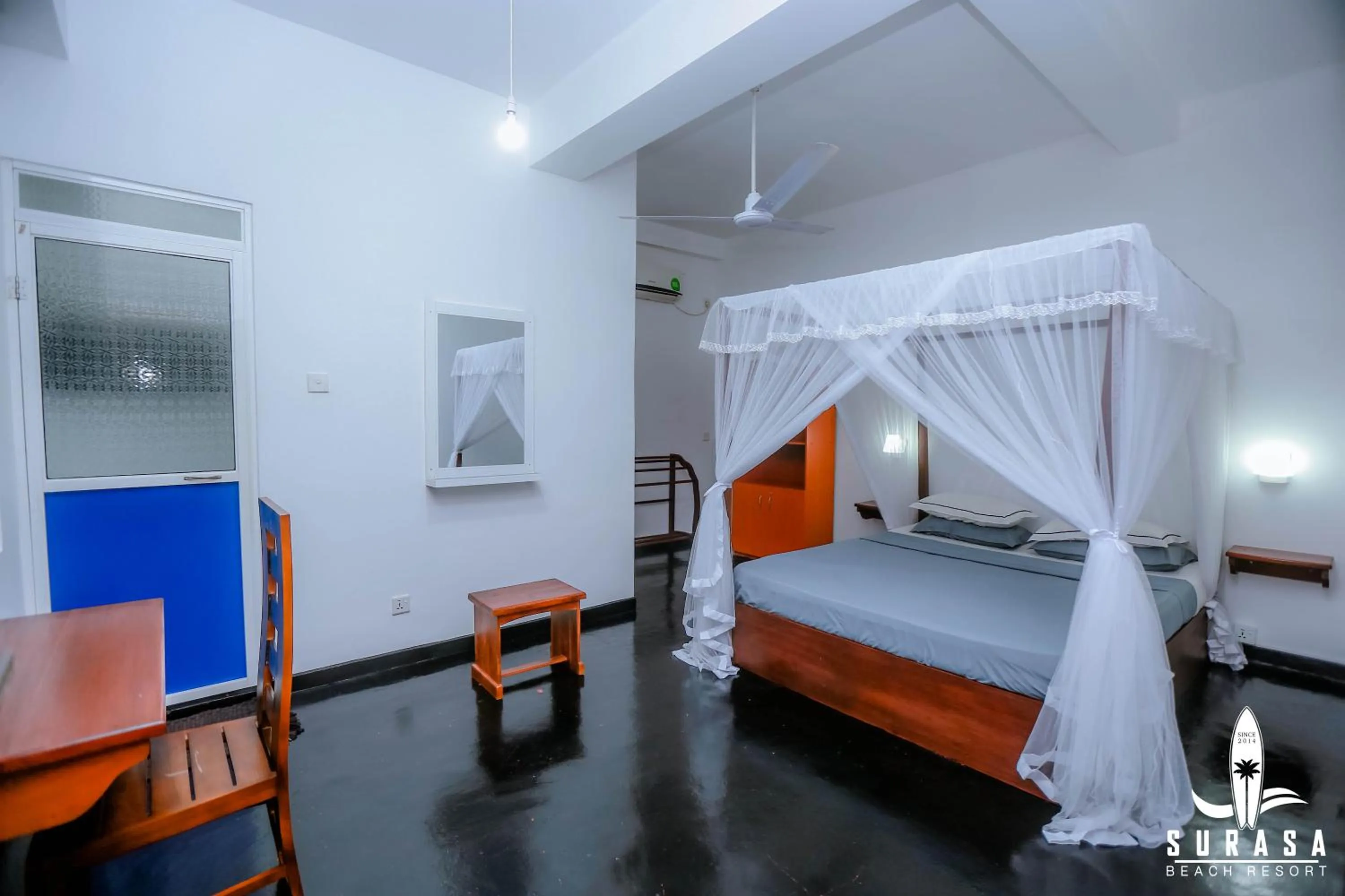 Bed in Surasa Beach Resort