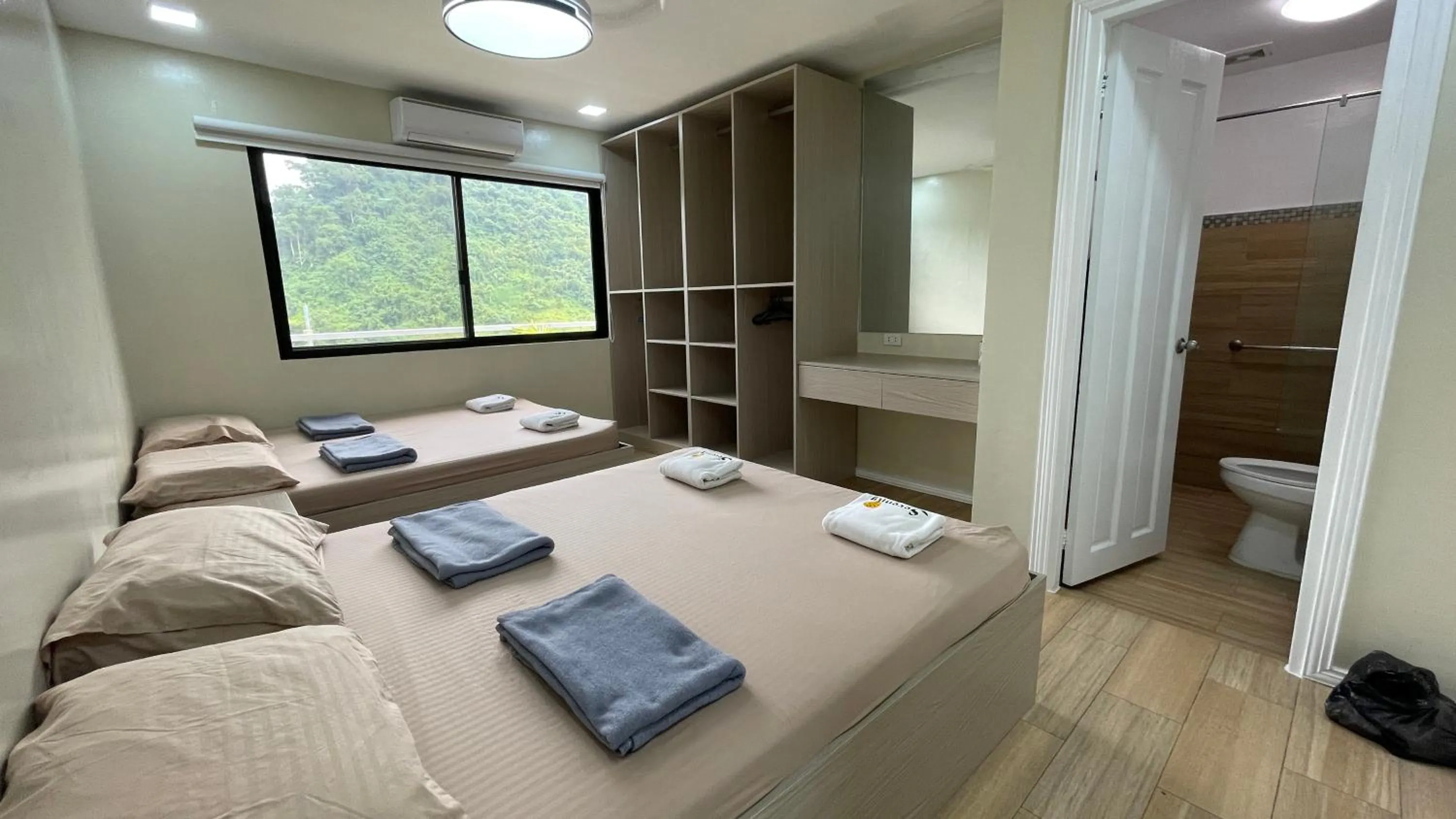 Photo of the whole room, Bed in Serenity Farm and Resort by Hiverooms