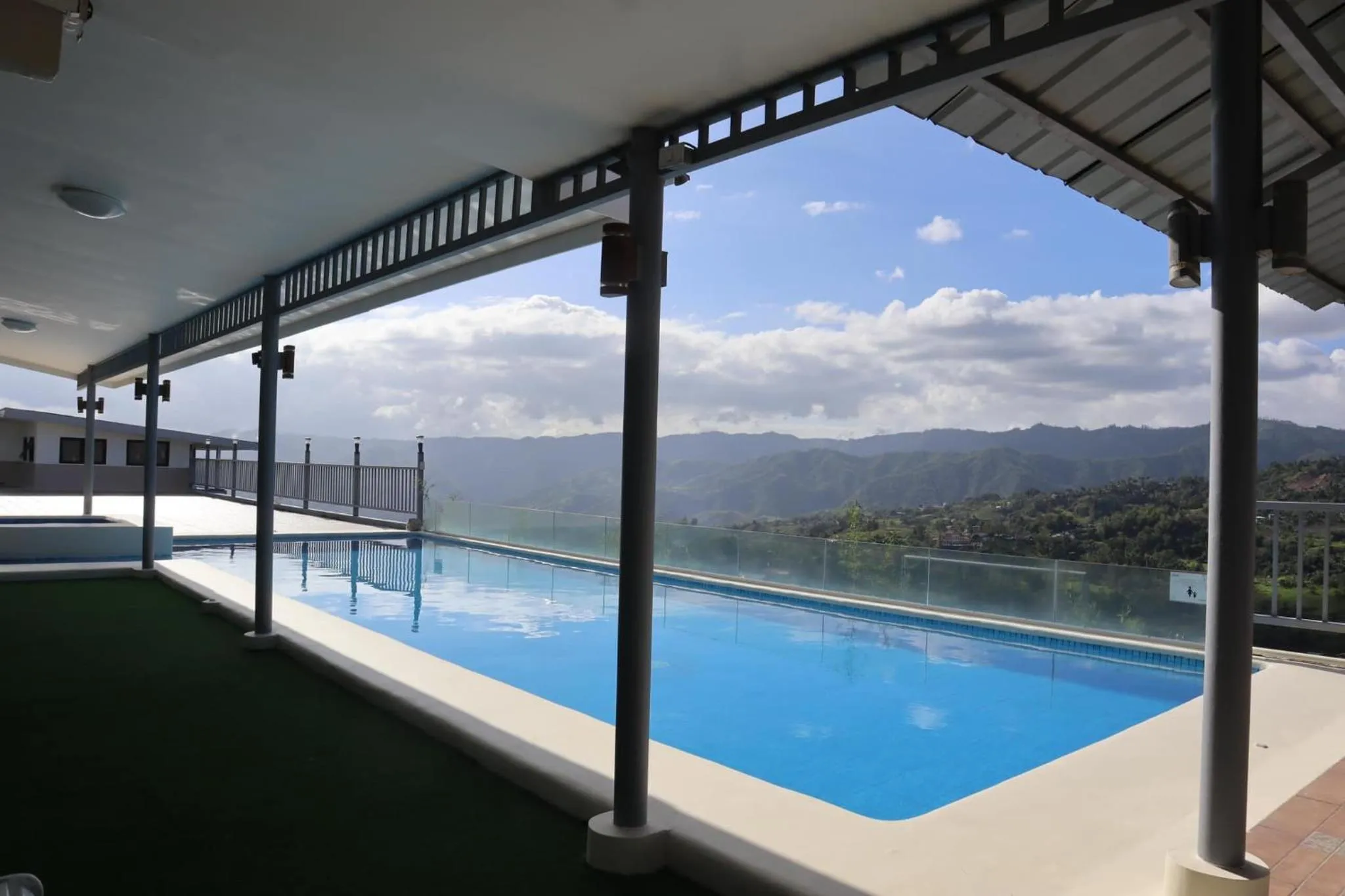 Pool view in Serenity Farm and Resort by Hiverooms