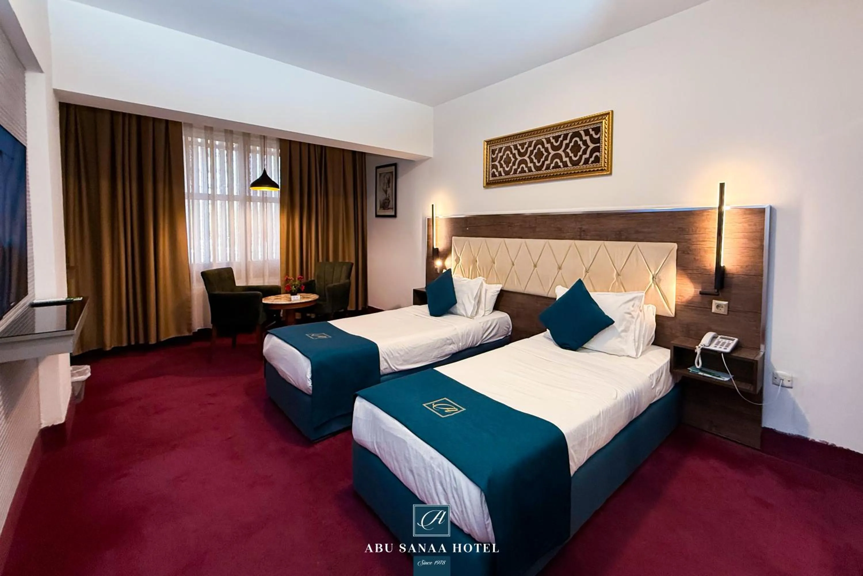 Bed in Abu Sanaa Hotel