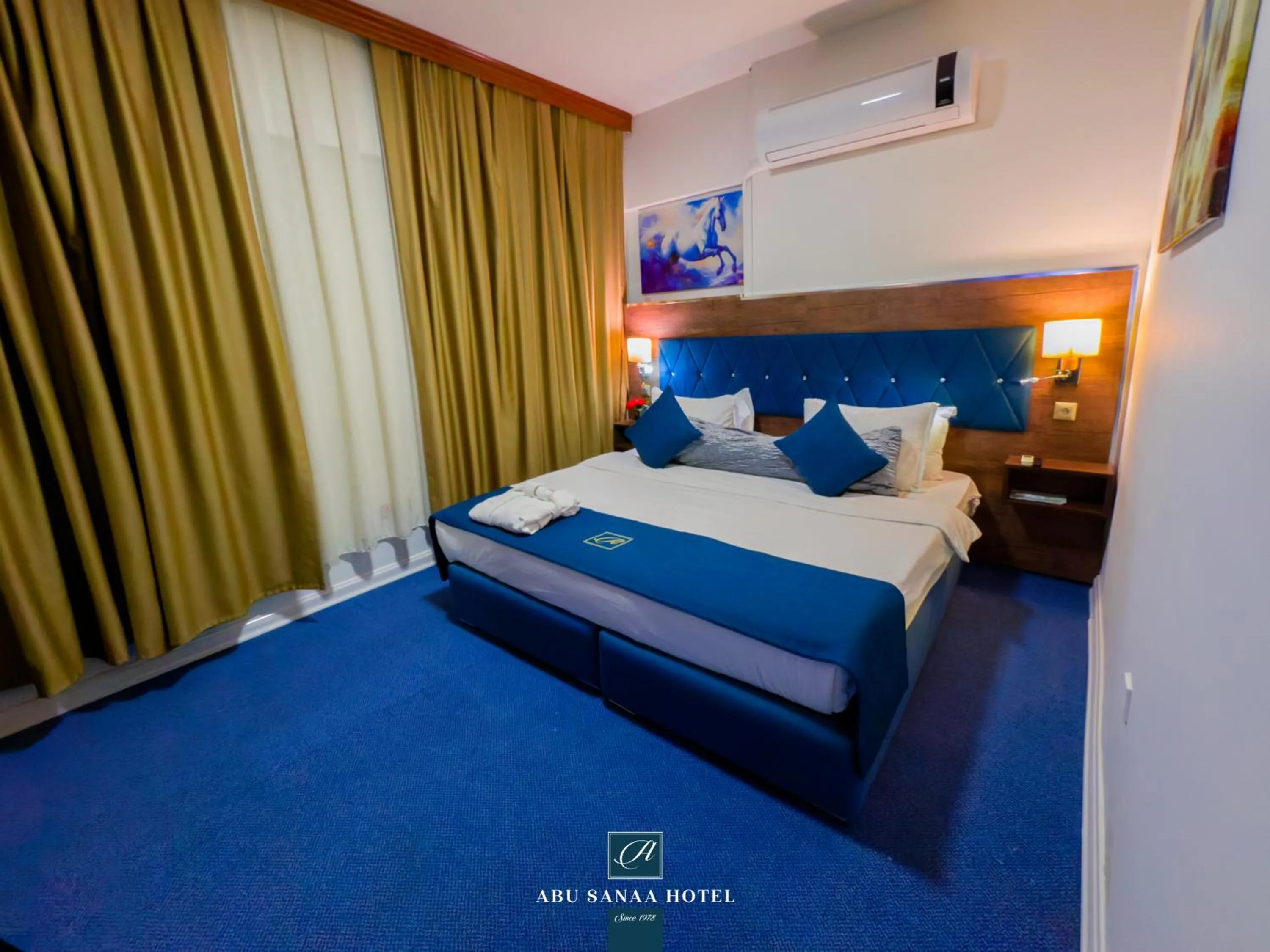 Bed in Abu Sanaa Hotel