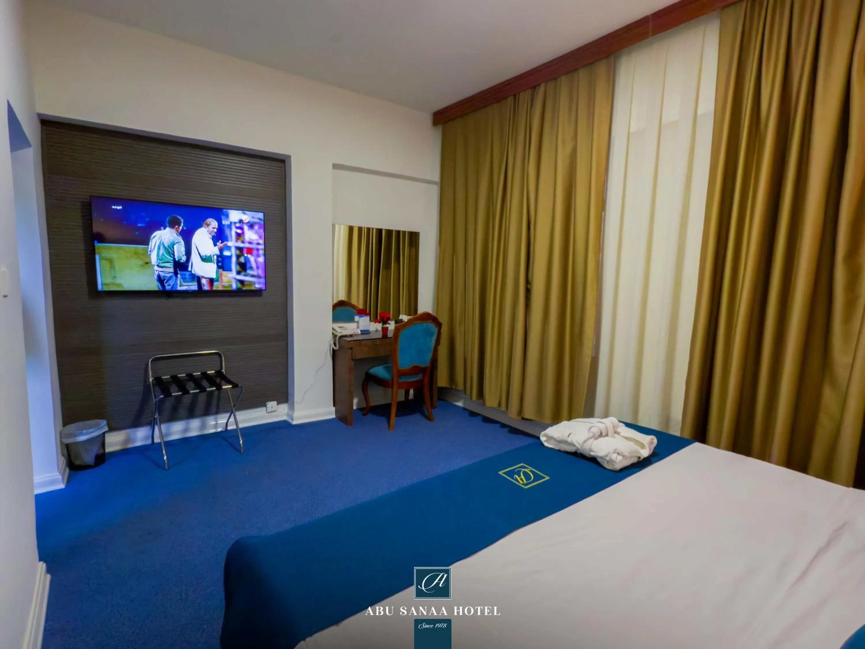 Bed in Abu Sanaa Hotel