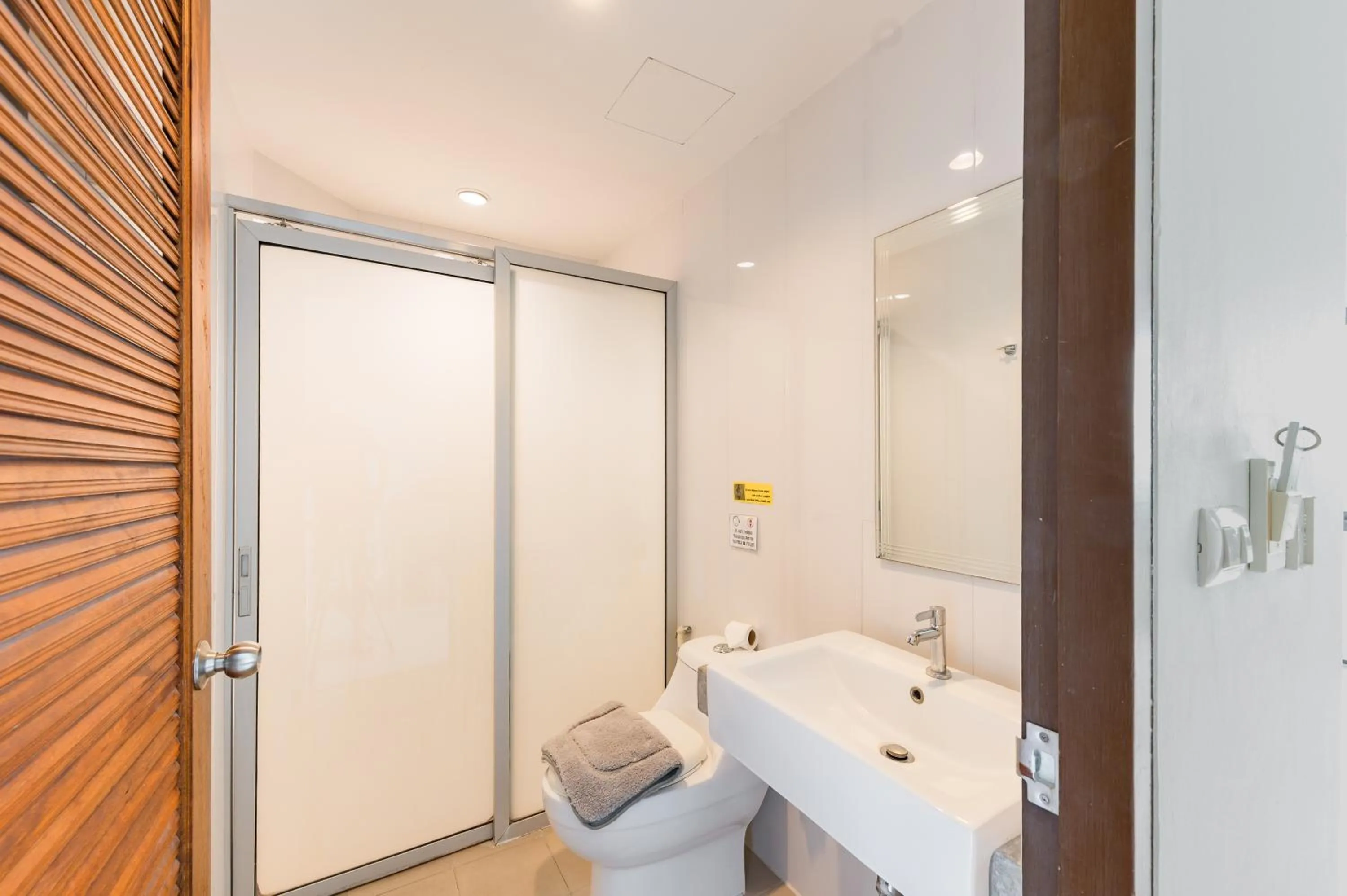 Bed in De Blue Sea Rawai Hotel