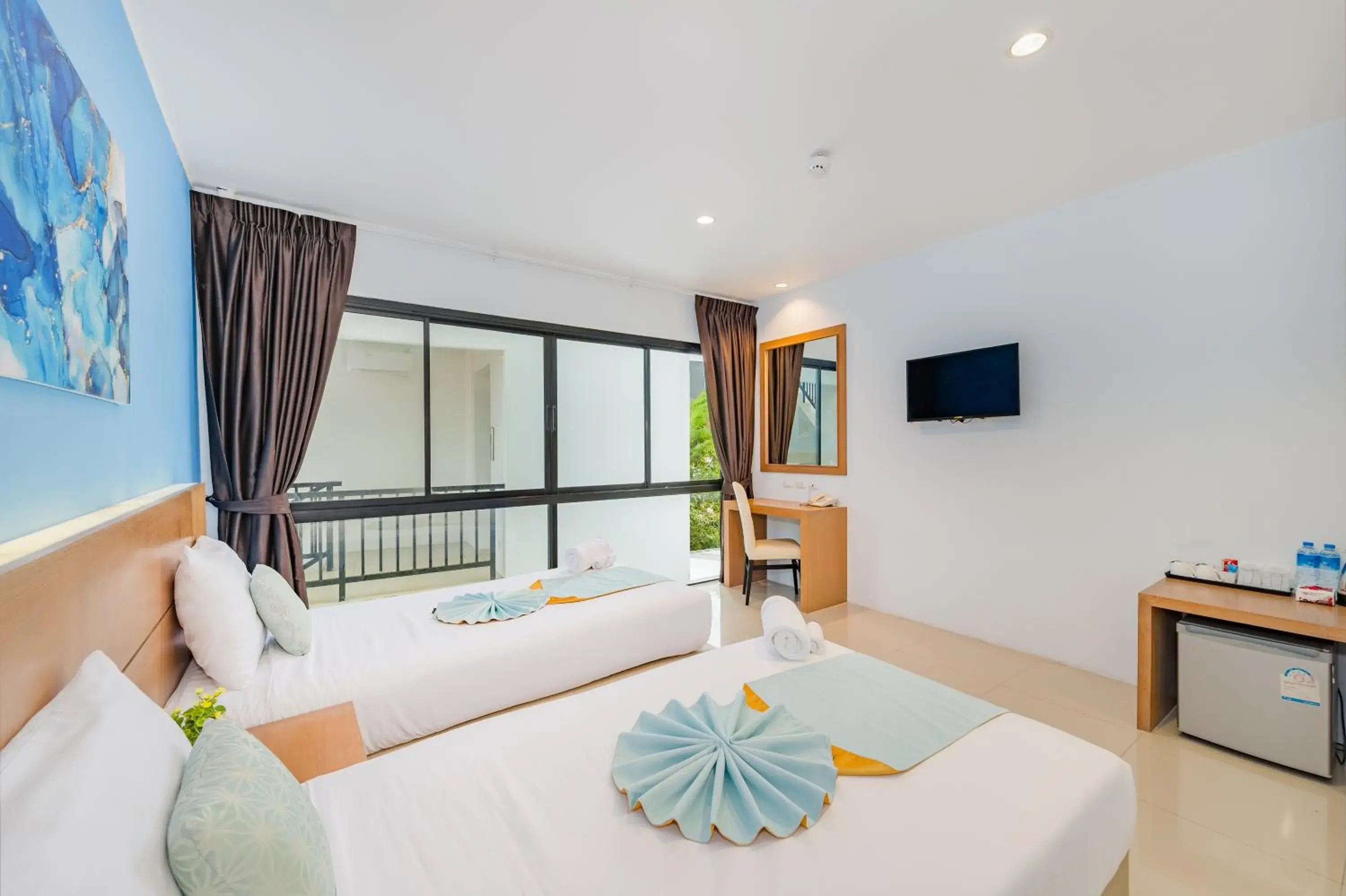 Bed in De Blue Sea Rawai Hotel Bed in De Blue Sea Rawai Hotel