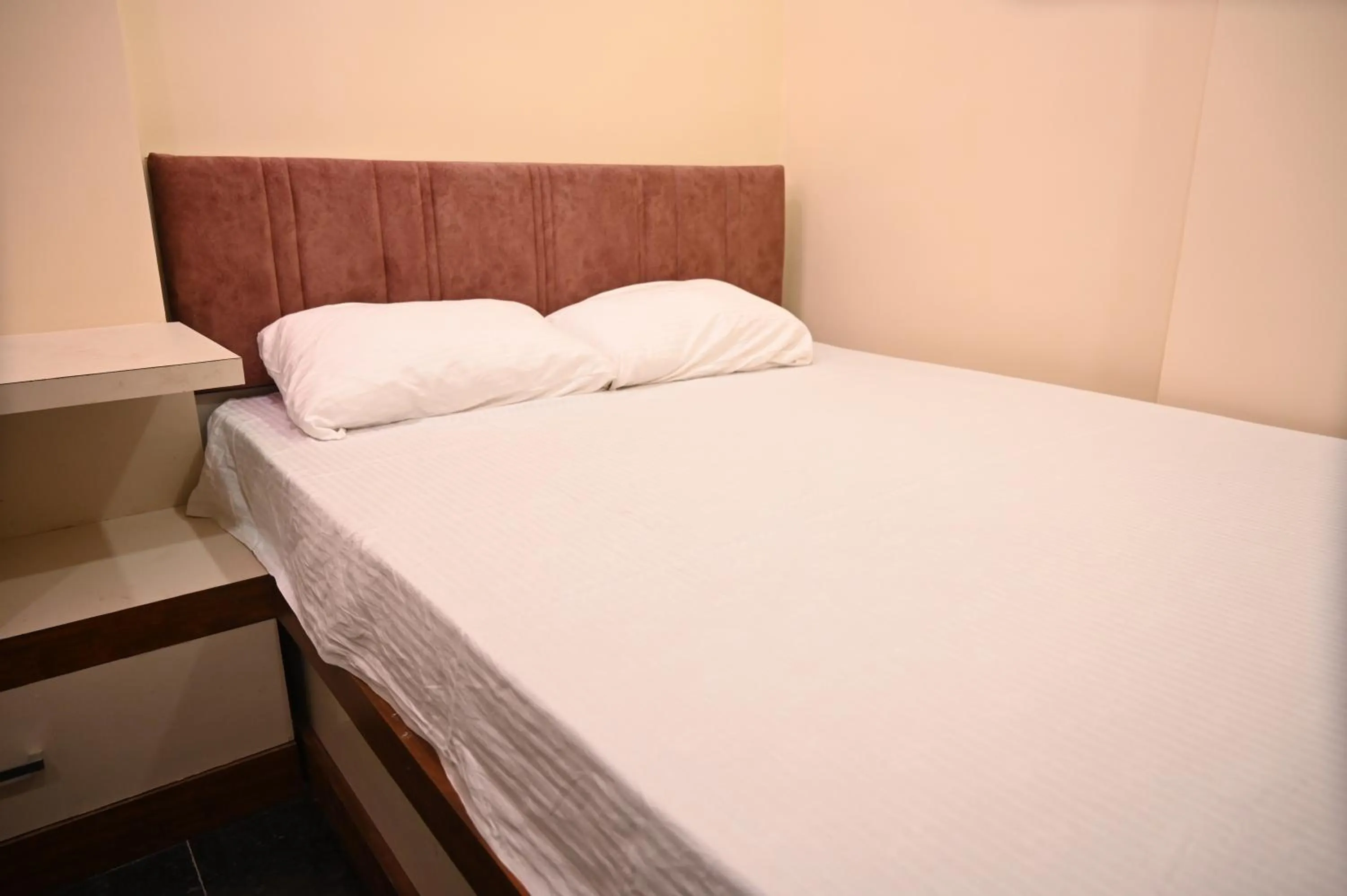 Bed in Hotel Royal Radiant