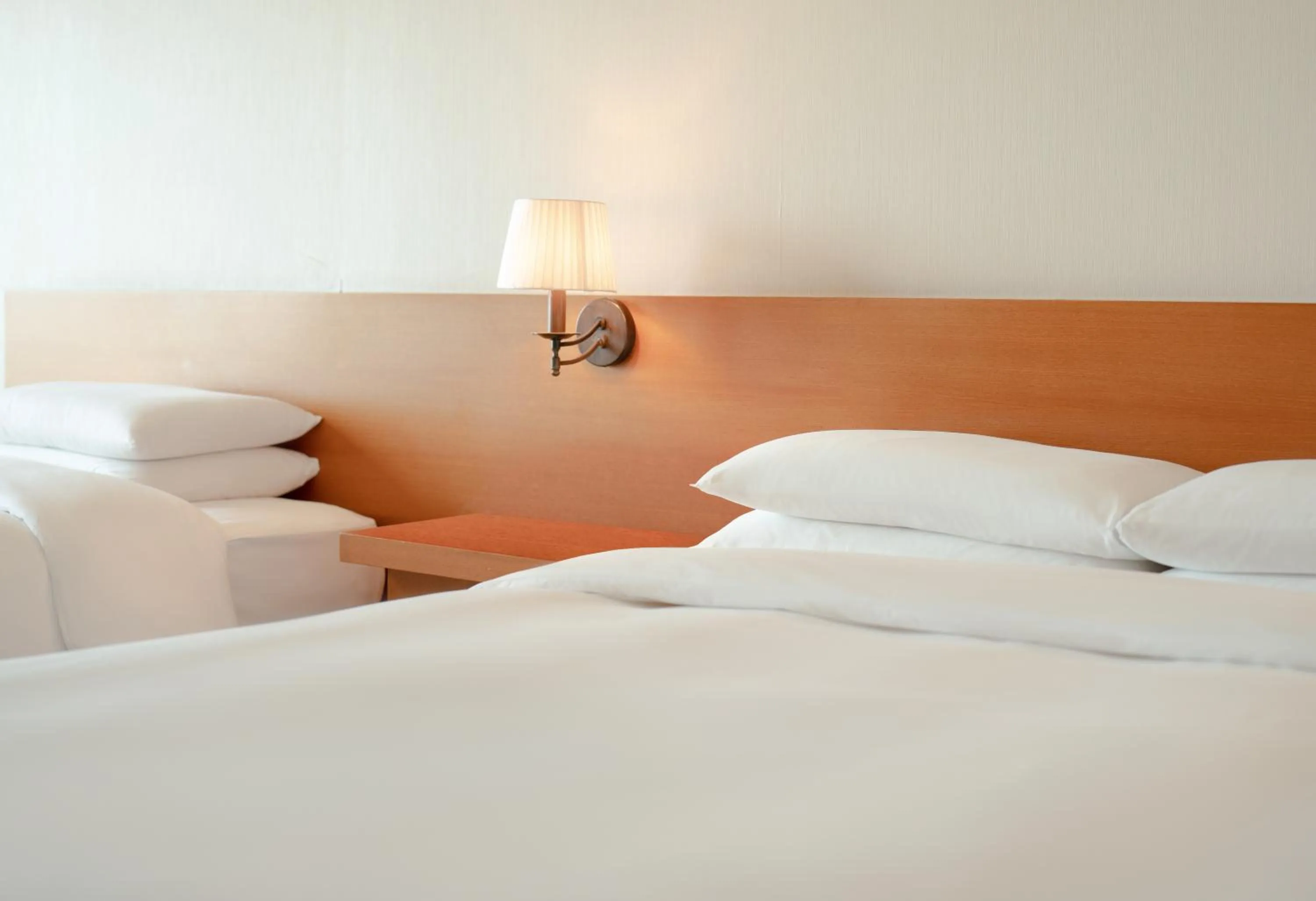 Bed in WE Hotel Jeju