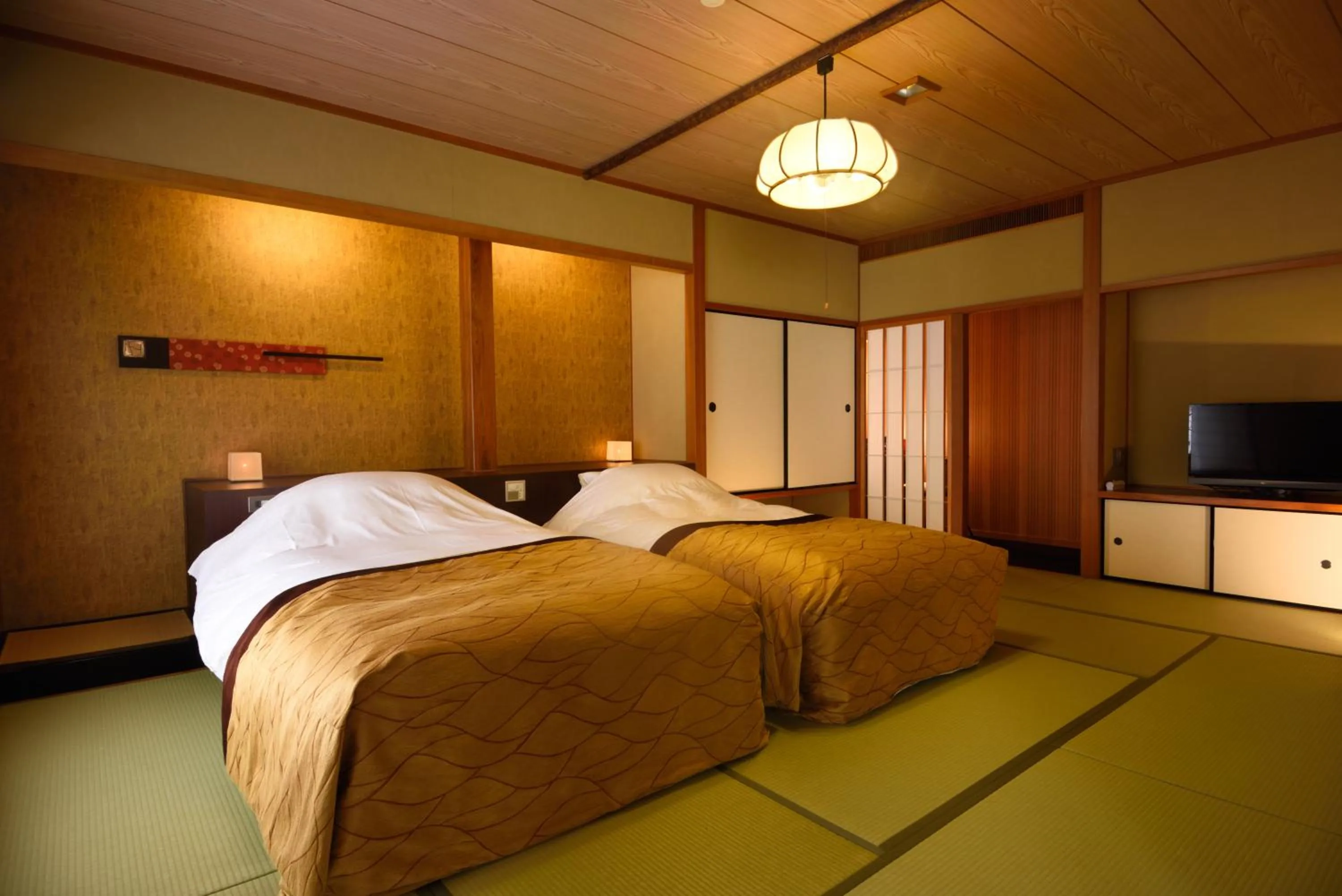 Bed in Kyo Yunohana Resort Suisen