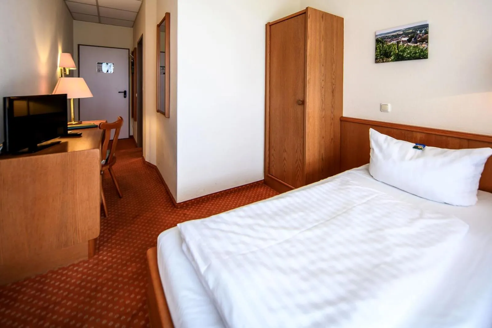 Bed in Hotel Rebschule