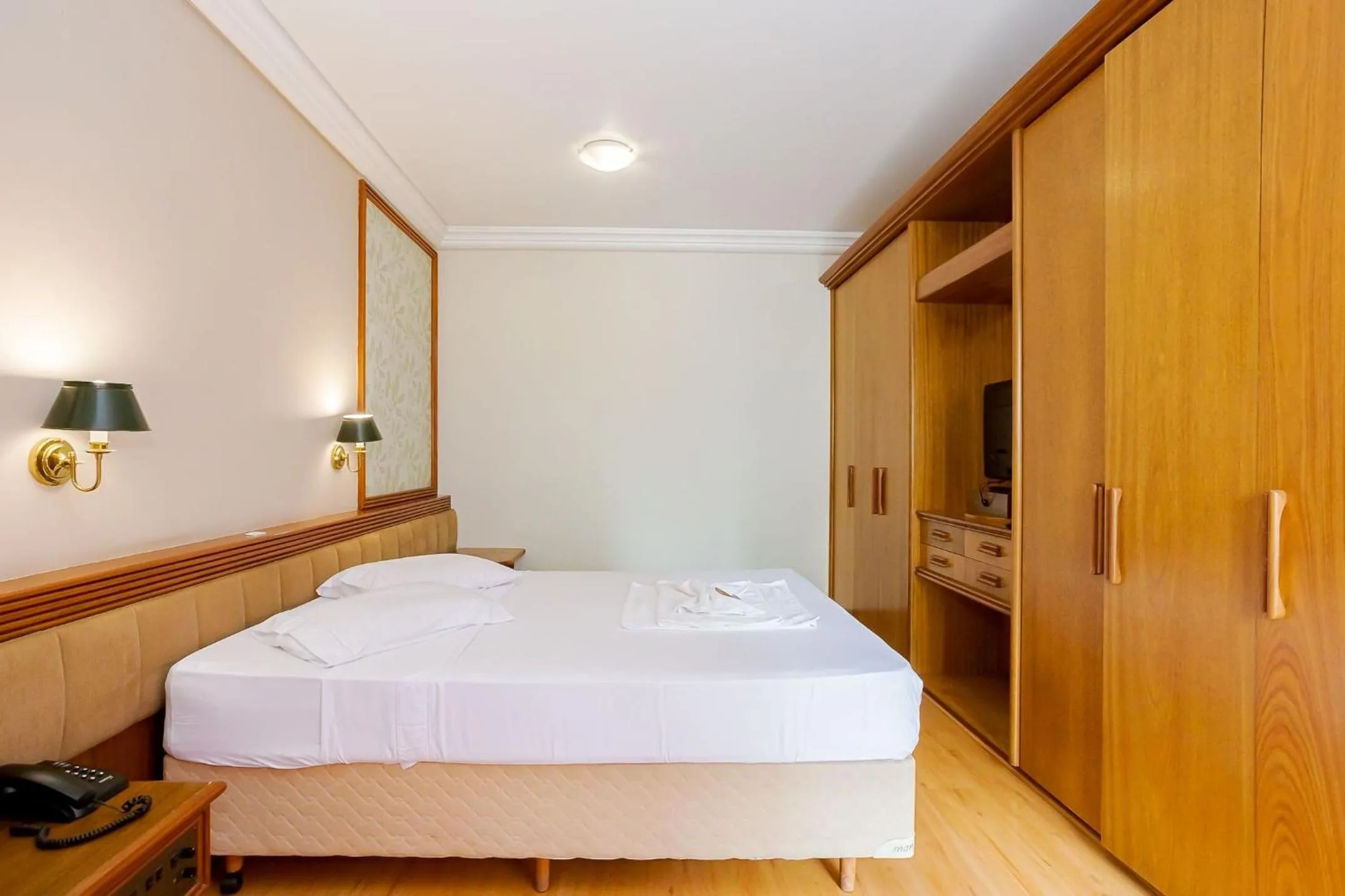 Bedroom, Bed in Batel Residence | Avenida do Batel | Gonzaga Stays