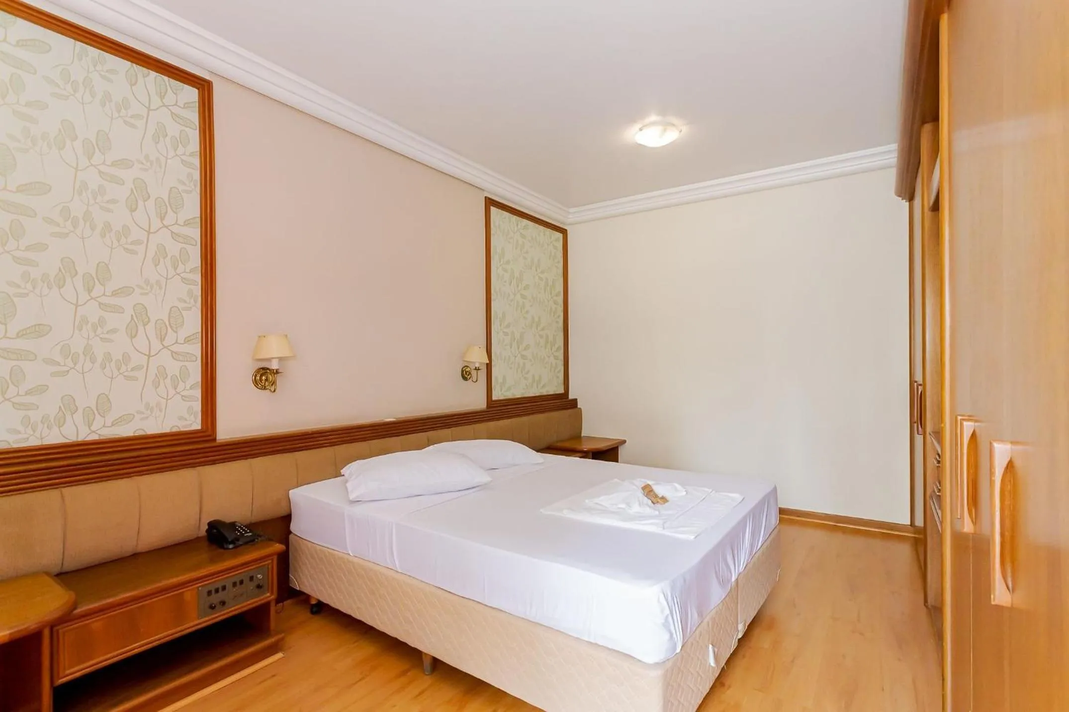 Bedroom, Bed in Batel Residence | Avenida do Batel | Gonzaga Stays