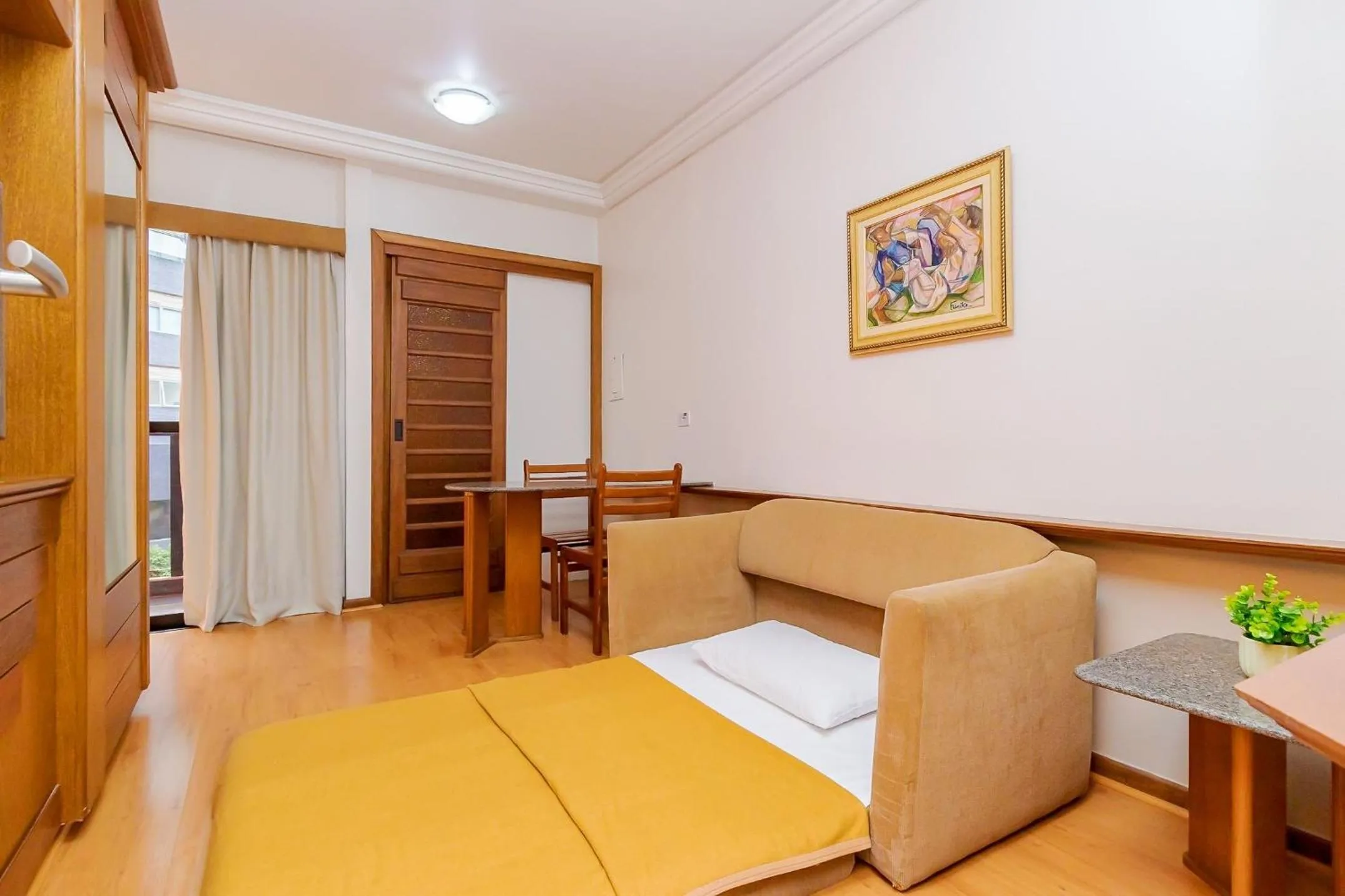 Living room, Bed in Batel Residence | Avenida do Batel | Gonzaga Stays
