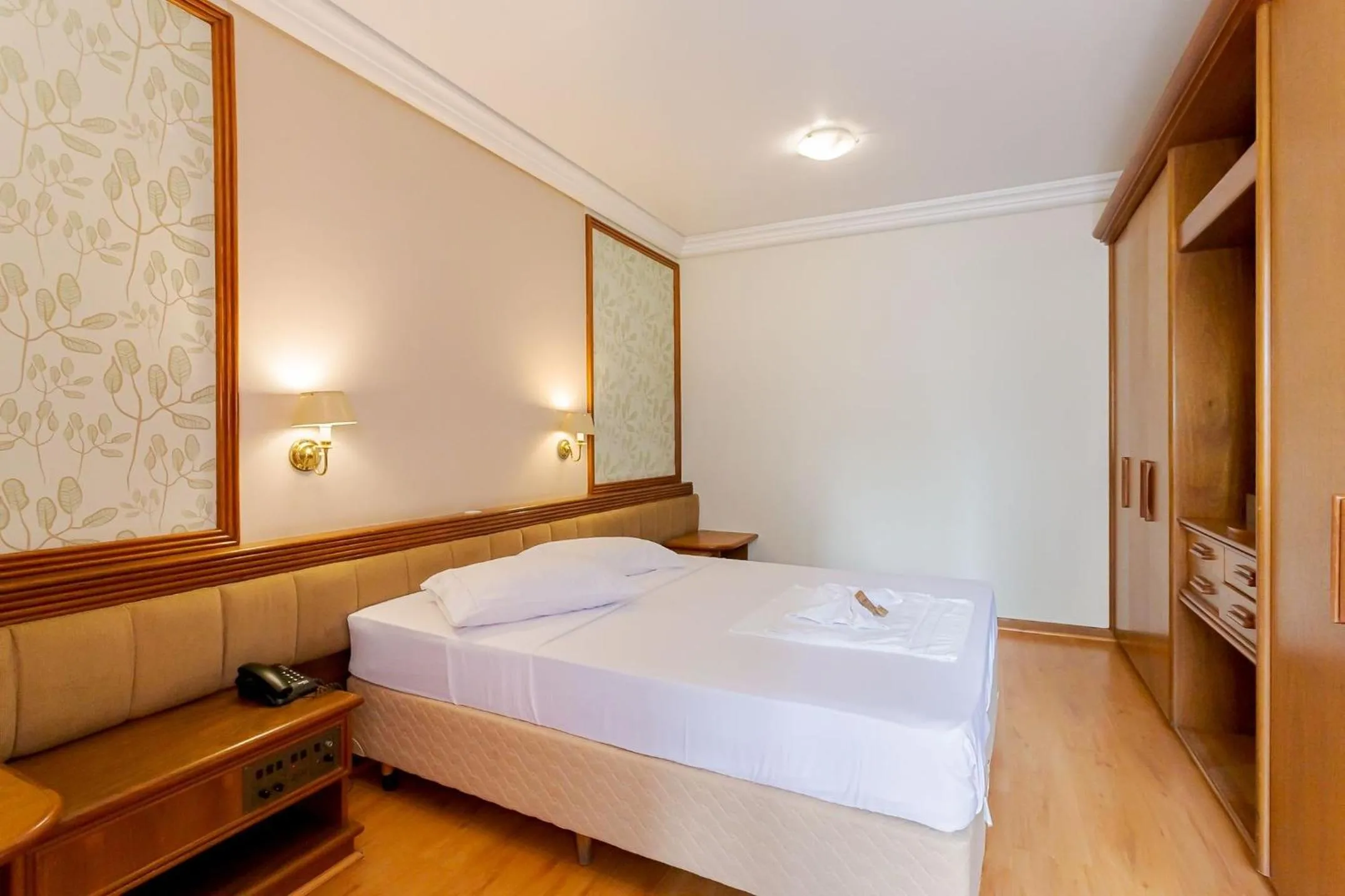 Bedroom, Bed in Batel Residence | Avenida do Batel | Gonzaga Stays