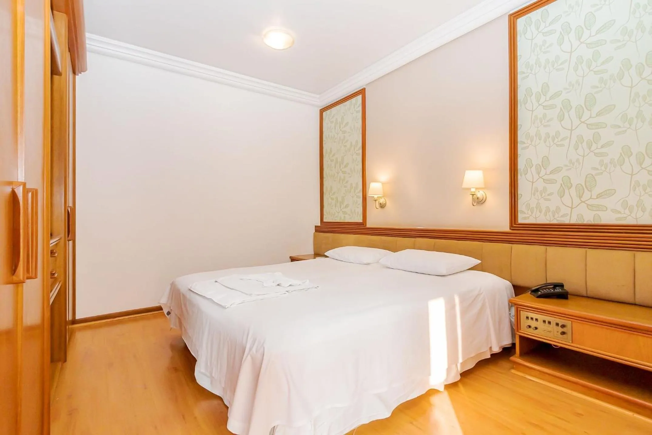 Bedroom, Bed in Batel Residence | Avenida do Batel | Gonzaga Stays