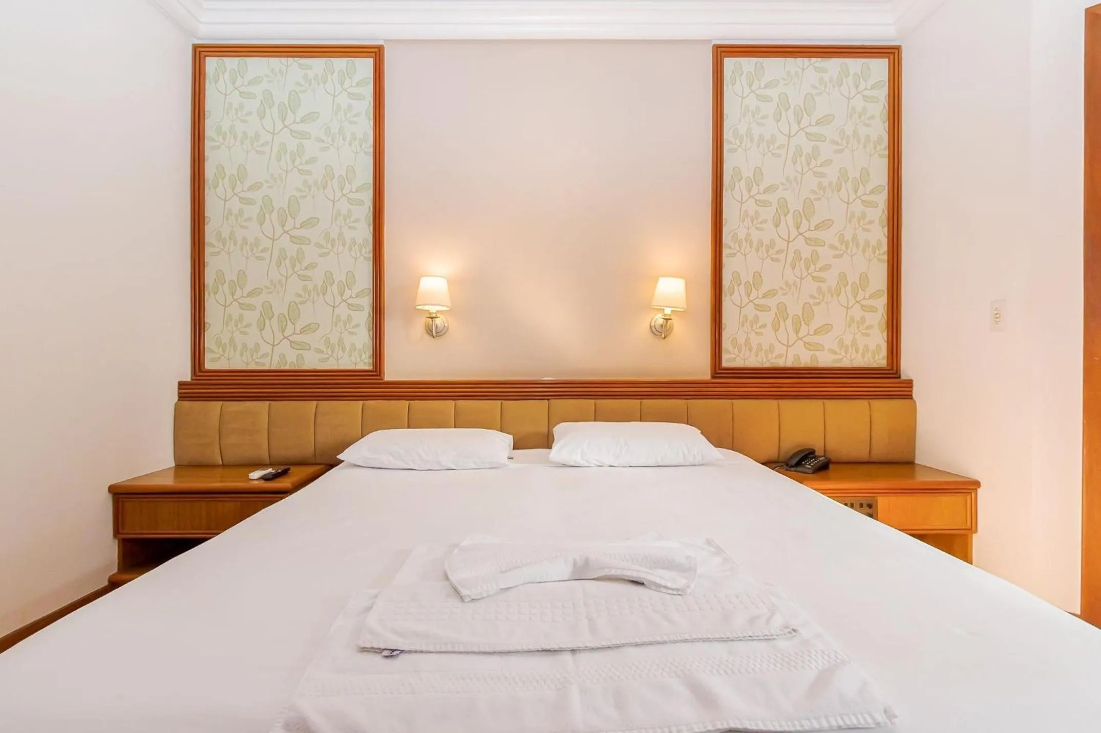 Bedroom, Bed in Batel Residence | Avenida do Batel | Gonzaga Stays