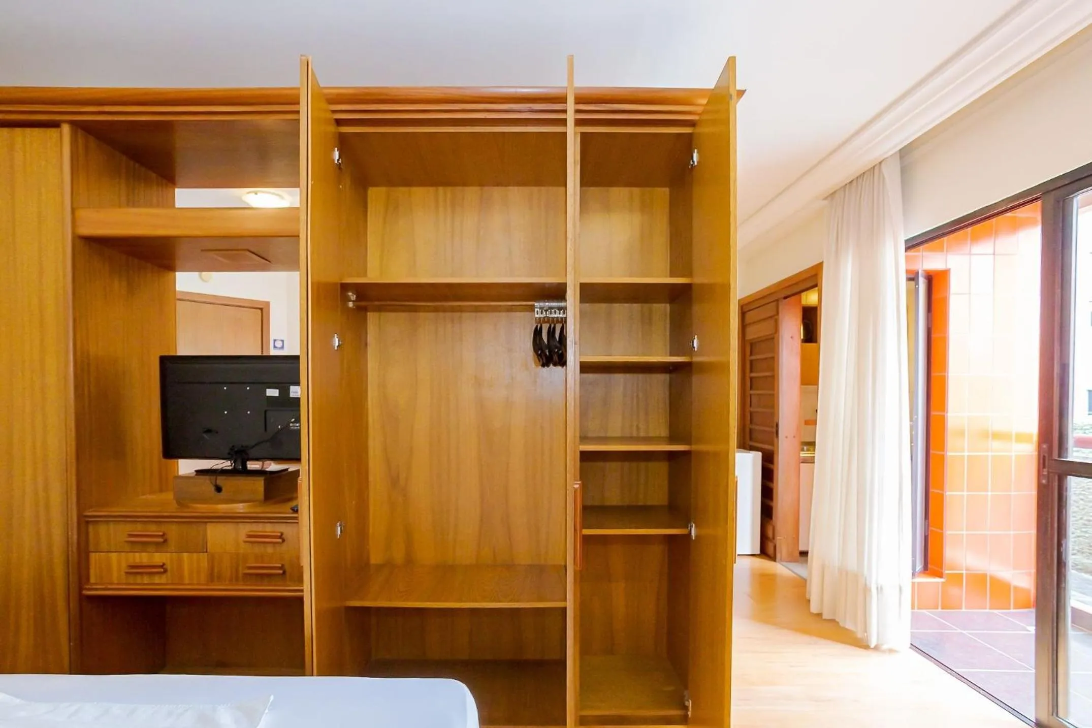 Bedroom, Bed in Batel Residence | Avenida do Batel | Gonzaga Stays