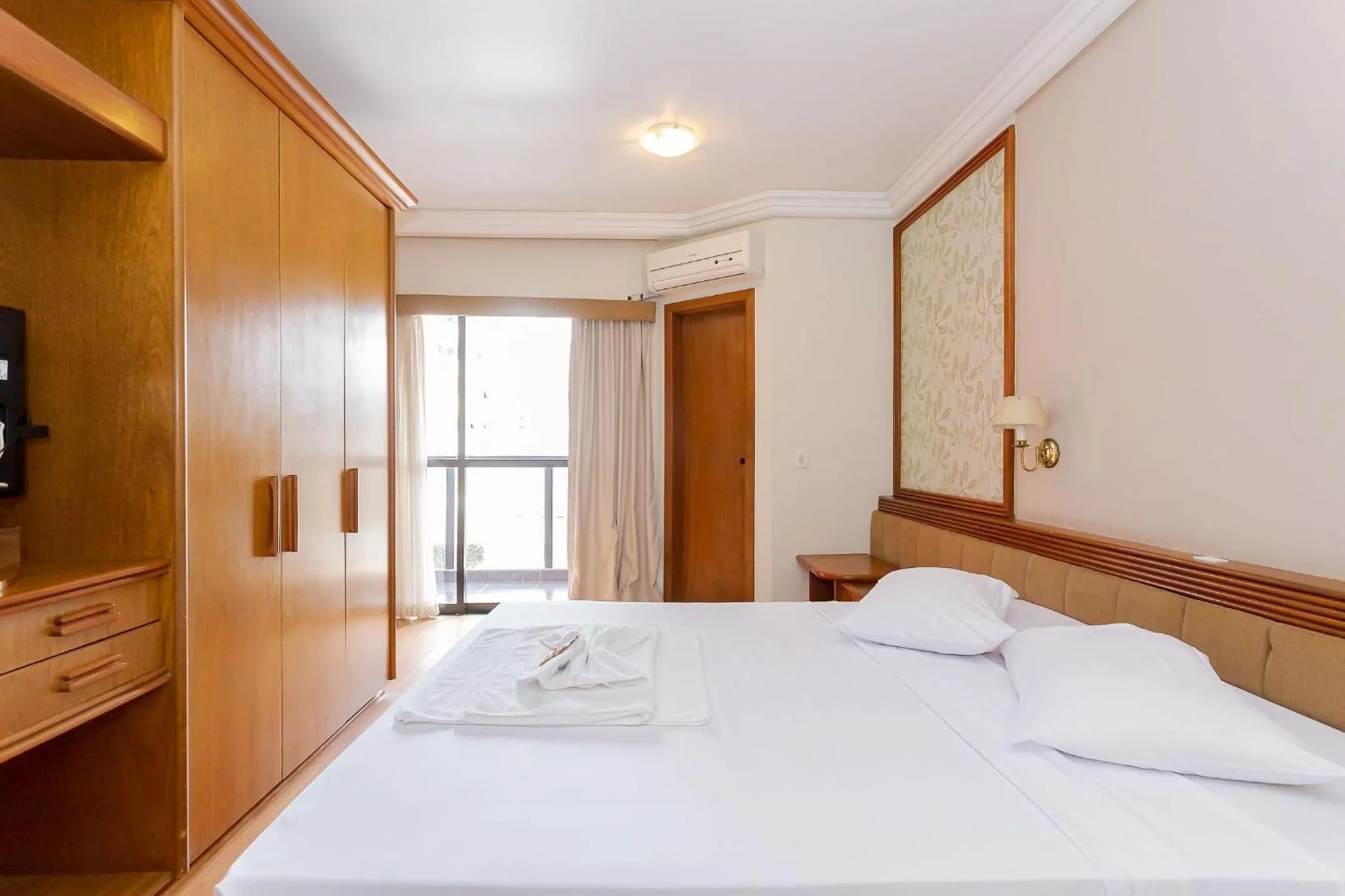 Bedroom, Bed in Batel Residence | Avenida do Batel | Gonzaga Stays