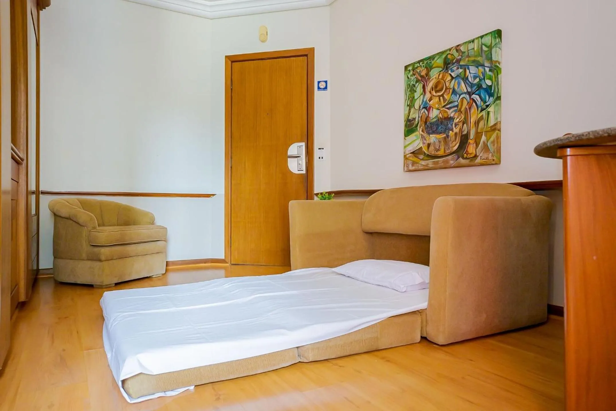 Living room, Bed in Batel Residence | Avenida do Batel | Gonzaga Stays