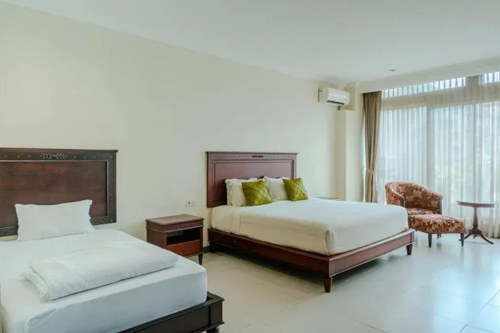 Triple Room in Maharani Guest House Triple Room in Maharani Guest House