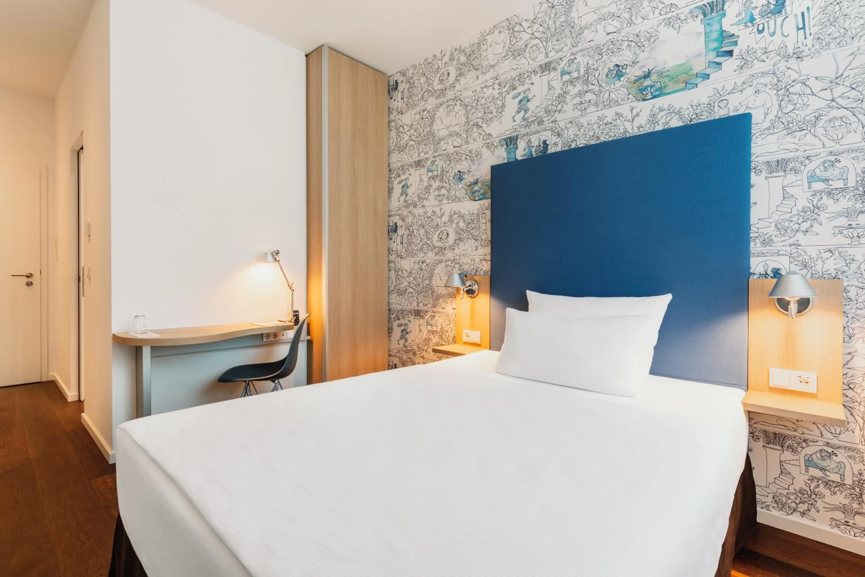 Bed in Grimms Hotel Hanau