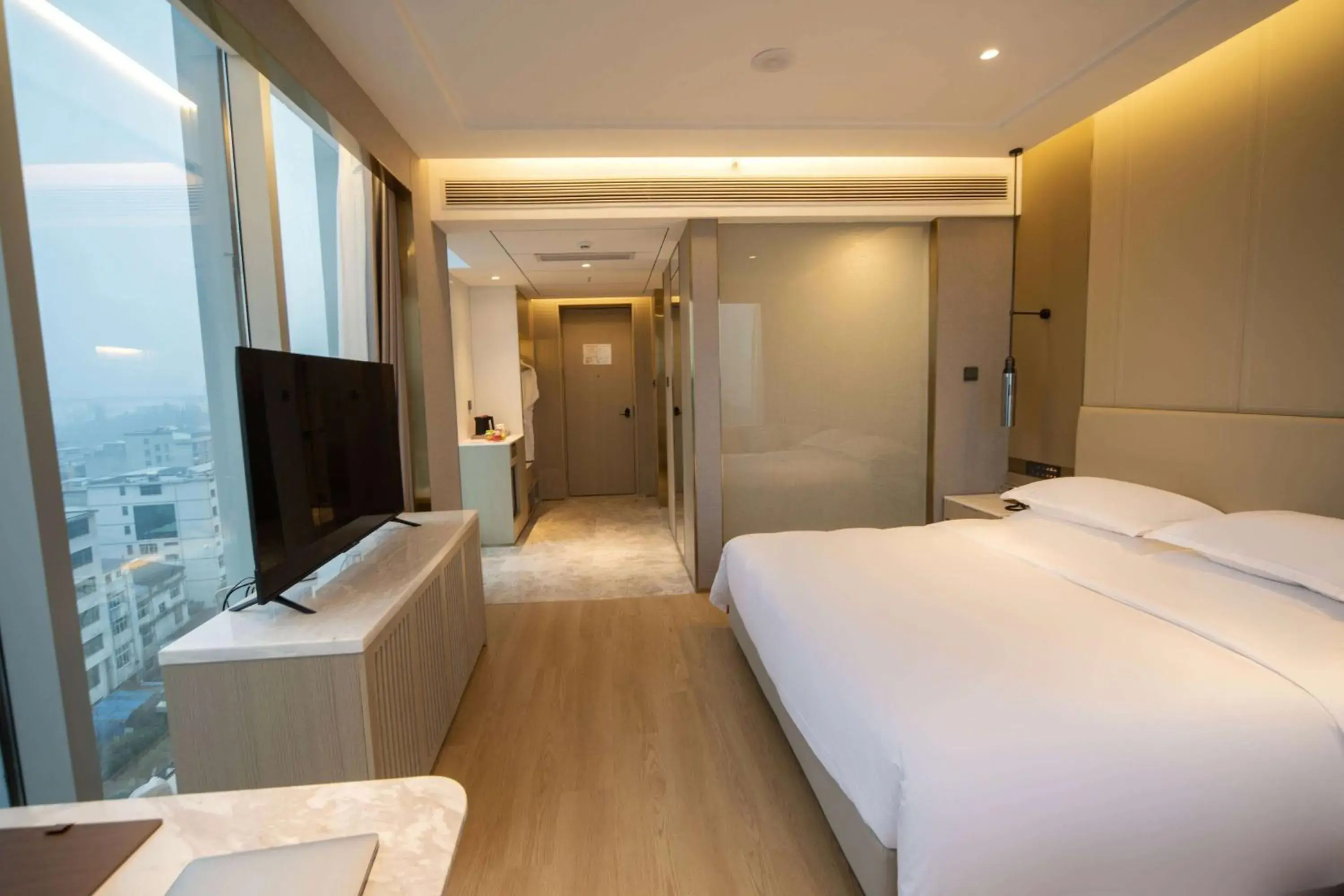 Photo of the whole room, Bed in Ramada by Wyndham Zhouning Photo of the whole room, Bed in Ramada by Wyndham Zhouning