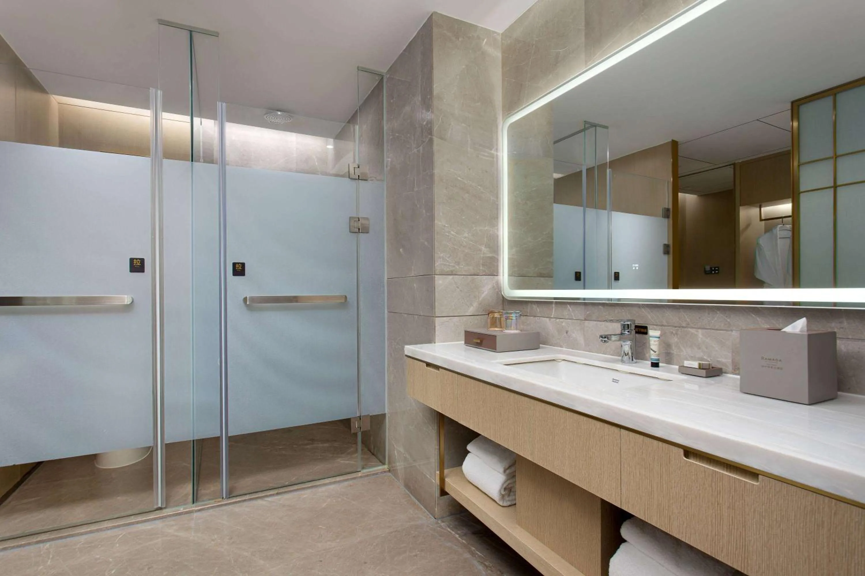 Bathroom in Ramada by Wyndham Zhouning