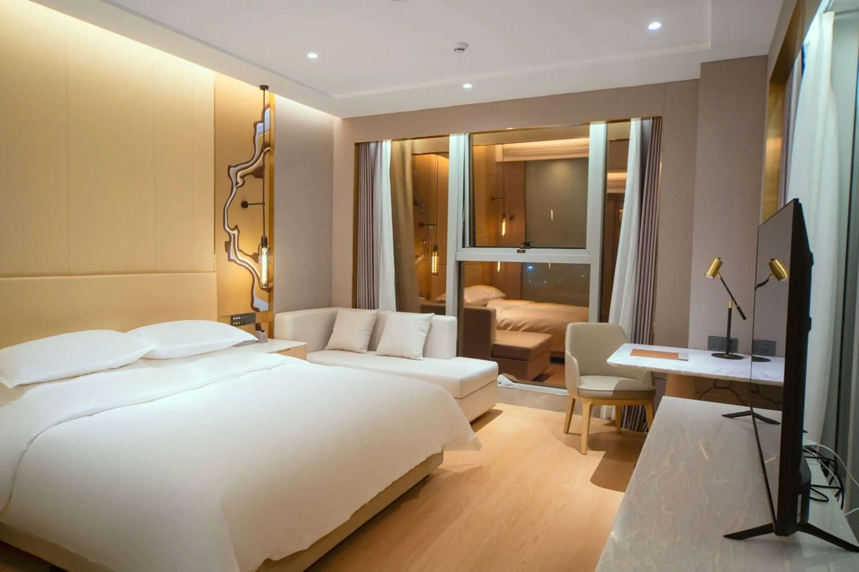 Photo of the whole room, Bed in Ramada by Wyndham Zhouning Photo of the whole room, Bed in Ramada by Wyndham Zhouning