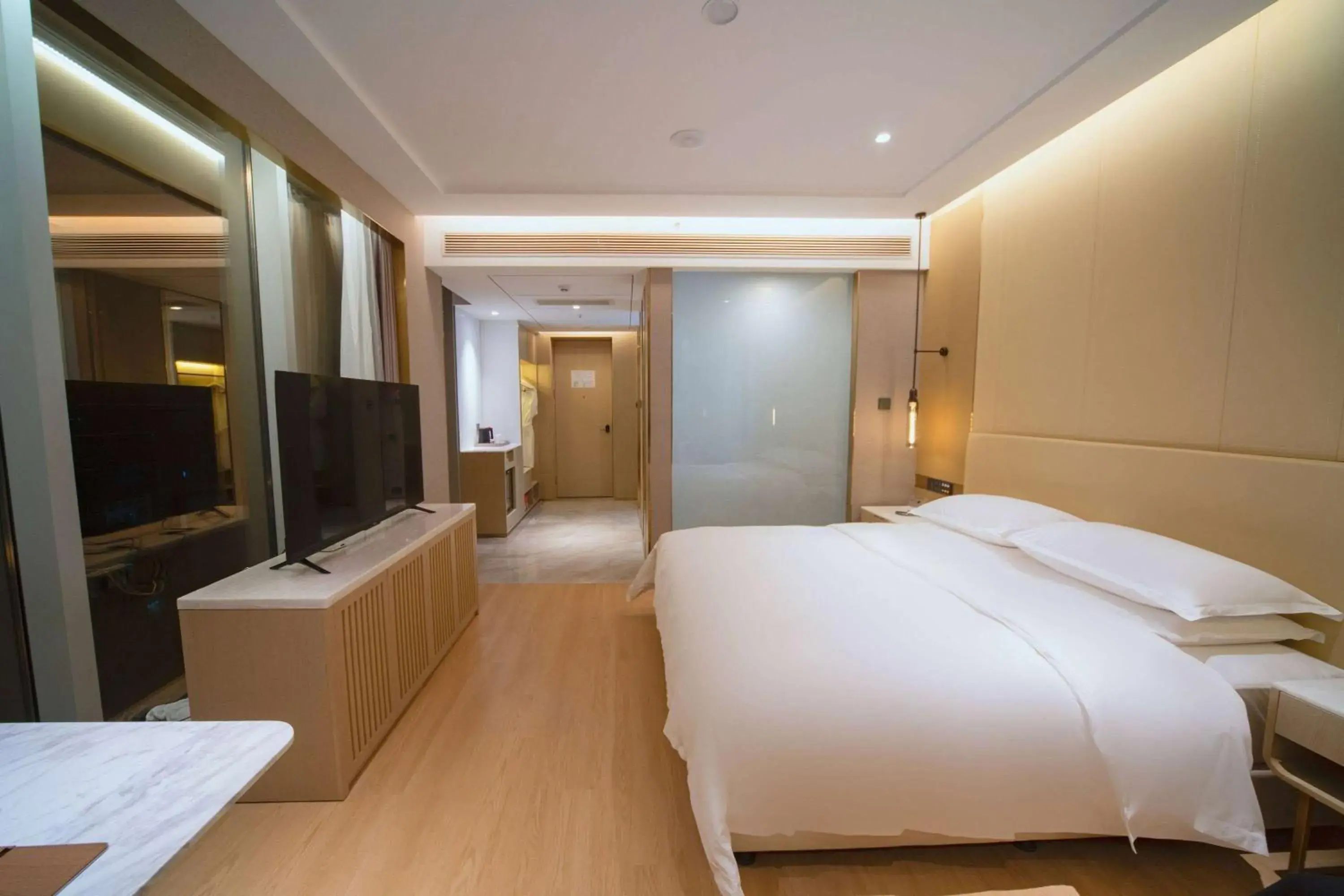 Photo of the whole room, Bed in Ramada by Wyndham Zhouning Photo of the whole room, Bed in Ramada by Wyndham Zhouning