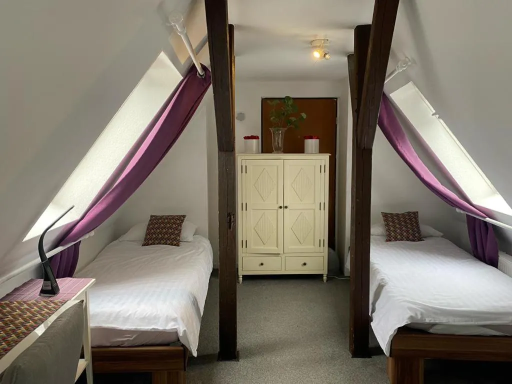 Bed in FHS ApartHotel