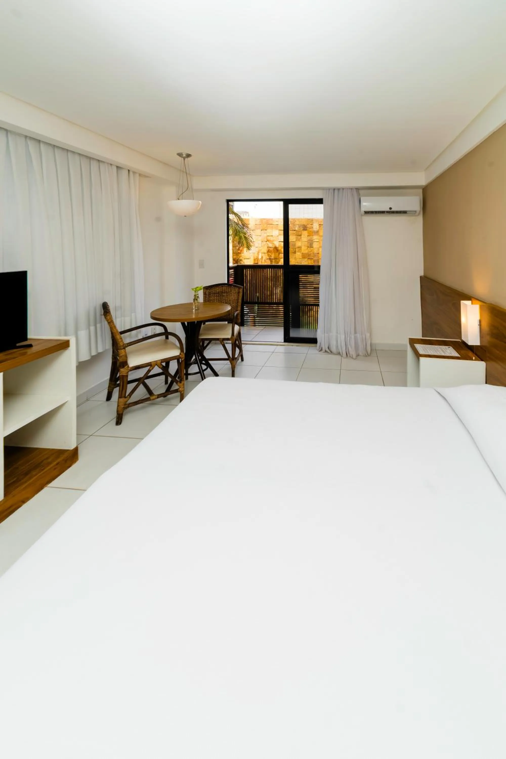 Bedroom, Bed in Porto Suítes Natal Hotel